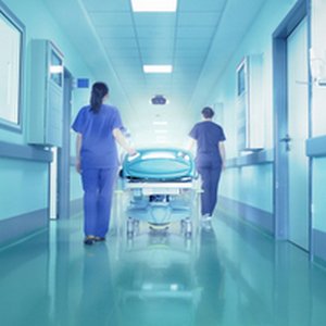 Bright lights at the end the hospital corridor. The concept of l